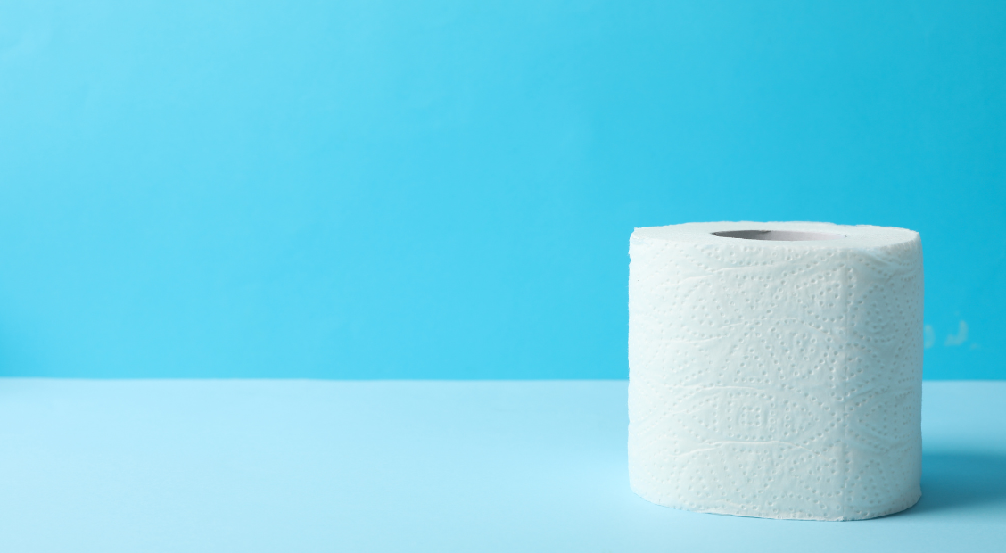 Photo of toilet paper roll over blue background